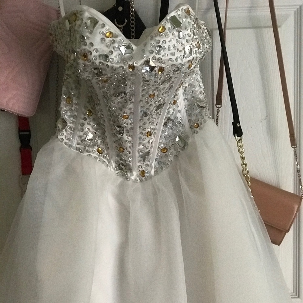 White/Cream colored homecoming dress.